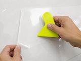 ESPATULA PLASTICA TRIANGULAR AMARILLA 9.5cm X 11.5cm