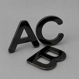 ALUMINIO COMPUESTO ALUKOMP NEGRO BRILLANTE PE 3MM/ 0.18 MM  1.22X2.44 MTS
